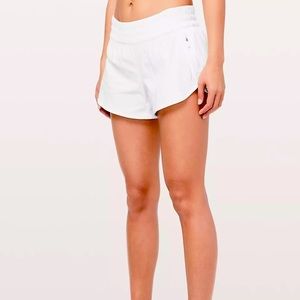 Size 8 mid rise white lulu lemon shorts brand new
